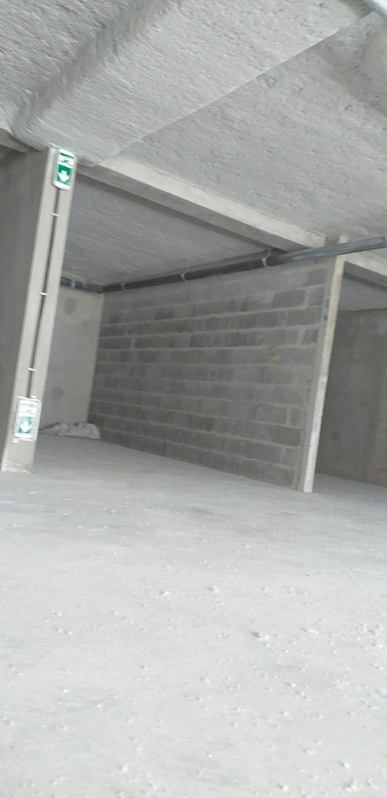 Plafond et poutres après flocage thermique sur le chantier de Lille